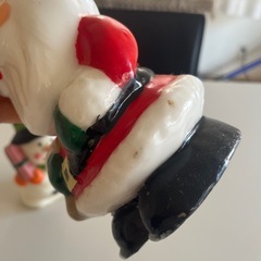 サンダルと雪だるまのローソクの画像