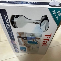 食器棚、電子レンジ、空気清浄機、スチーマーの画像