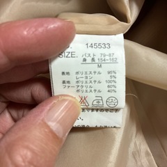レディースコートサイズM記載の画像