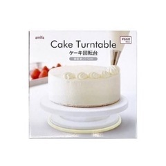 ケーキ回転台＆クリームしぼり袋＆ろうそく15本（今年中に処分予定）の画像