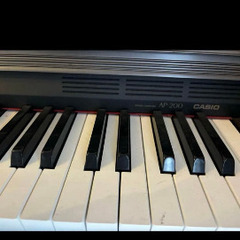 CASIO 電子ピアノ 黒色 椅子付きの画像