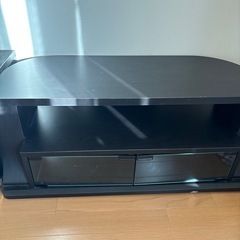 無料お譲り　黒のオーバル型テレビ台　ガラス扉付き収納ありの画像