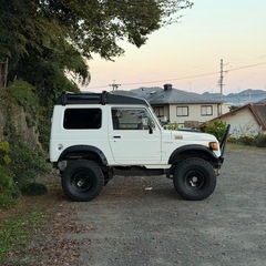 【低走行3.3万km】JA11 ジムニー MT／ランクル70仕様／31インチ／ラプターライナーの画像