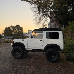 【低走行3.3万km】JA11 ジムニー MT／ランクル70仕様／31インチ／ラプターライナーの画像