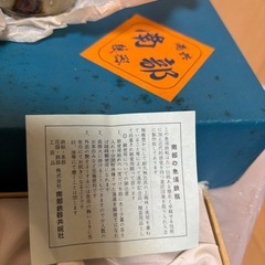 南部鉄器と湯呑み２つのセットの画像