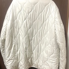 オフホワイト キルティング ジャンパーの画像