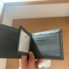 COACH グレー 二つ折り財布 保存袋付きの画像