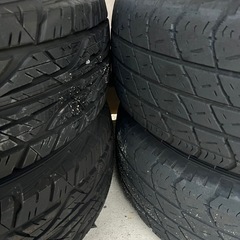 215系サーフ純正ホイール　、タイヤ付きの画像