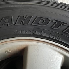 215系サーフ純正ホイール　、タイヤ付きの画像