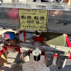 松本式ネギ皮剥き機の画像