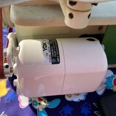 世界初の家庭用小型ロックミシンの画像