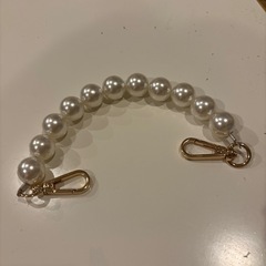 ベージュ小さめハンドバックの画像