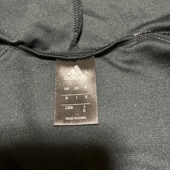 adidasフード付きジャージ上下セットの画像