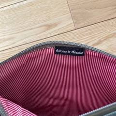 Herschel ストライプ クラッチバッグ グレー　ポーチの画像