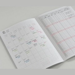 ブックスタンド英語ノート2冊2026年手帳1冊日記1冊ティッシュ、マグネットの画像