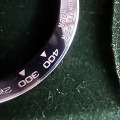 現行ロレックスデイトナ正規ステンレスベゼル（傷あり）の画像