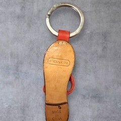 コーチ COACH キーホルダー ピンク サンダルの画像