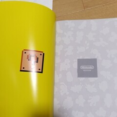 新品★任天堂ミュージアム公式ガイドブック Vol.01 日本語版★限定ポストカード2枚付/スーパーマリオブラザーズ40周年 /記念 /任天堂公式資料/限定品の画像