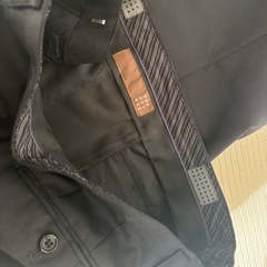 メンズ　スーツ　黒　フォーマルの画像