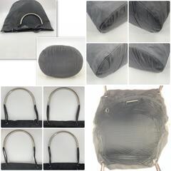 PRADA プラダハンドバッグ トートバッグ 腕掛け テスートナイロン レザー 本革 ブラック 黒 メタルハンドルトライアングル 三角ロゴプレート 白タグ バケツ型 大容量 軽量 通勤 通学 ビジネス レディース メンズ ユニセックスの画像