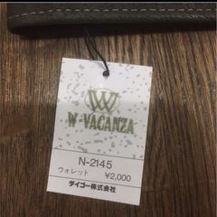 新品　タグ付き　ミニ財布の画像