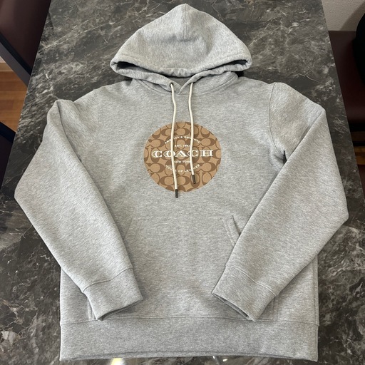 新品コーチ　パーカー