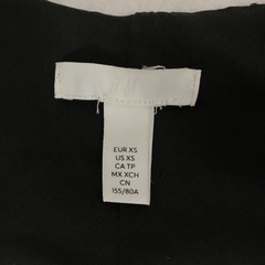 H&M テクスチャード Vネック ミニワンピースの画像