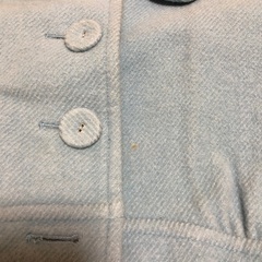 ブルーのウールコートの画像