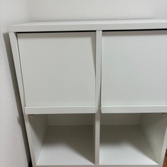 雑誌ラック付き収納棚の画像