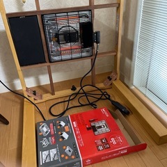 回転可能いすに座る高さのコタツセットの画像