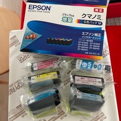 プリンター用インクとA4コピー用紙1冊の画像