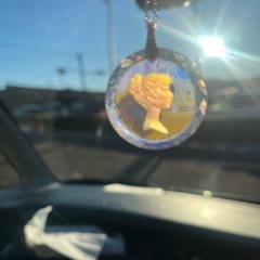 ヴィンテージ　インタリオガラスのペンダント・ネックレス　オーロラ加工の画像