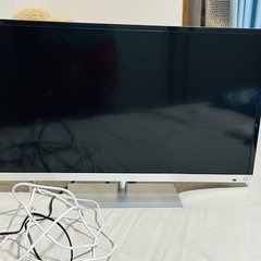 シングルベッドフレーム、電子レンジ、東芝テレビの画像