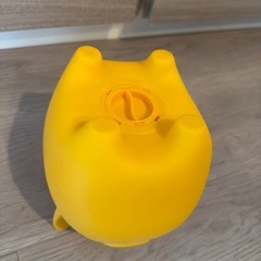 ブタの貯金箱、黄色の画像