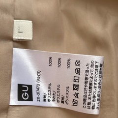 GU ジーユー　ダウン　ベージュ　の画像