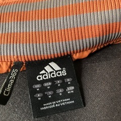 adidas オレンジ ナイロンジャケットの画像