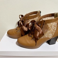 axes femme 靴の画像