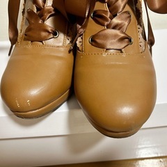 axes femme 靴の画像