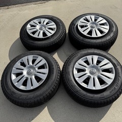 【新車外し】日産 キャラバン 純正タイヤ＋鉄ホイール 4本セット 195/80R15 ホイールキャップ付き 走行50km未満 の画像