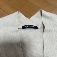 ベージュ　カーディガンの画像