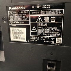 Panasonic 32インチ テレビとテレビ台の画像
