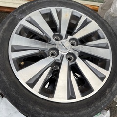 ブラックとシルバーのアルミ 165/55R15 4.5jの画像