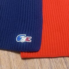 ラコステのスポーツマフラーの画像