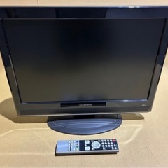 テレビ   と　コードレス掃除機の画像