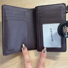 COACH二つ折り財布の画像