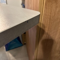 昇降式ダイニングテーブル　モルタル調の画像