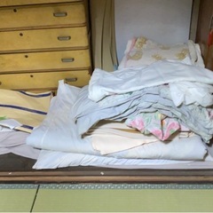 布団とマットレスとシーツ類の画像