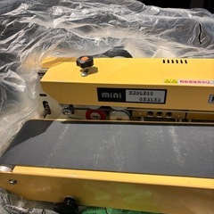 志賀包装機　　ミニエンドレスシーラーの画像