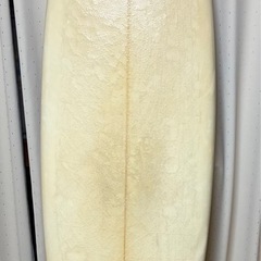 FCSサーフボードとスーツの画像