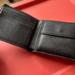 coach 折りたたみ財布の画像